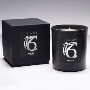 Illumine Capricorn Vetiver Candle and box with a Grey background