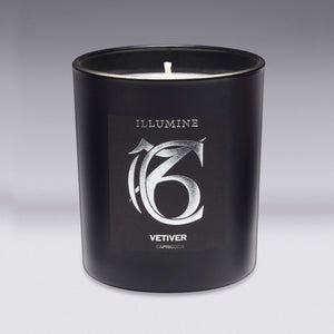 Illumine Capricorn Vetiver Candle with a Grey background