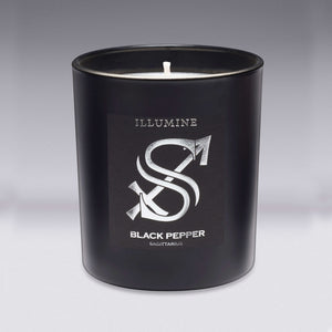Illumine Sagittarius Black Pepper Candle with a Grey background